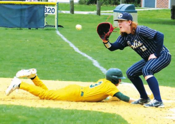 KEEPING IT CLOSE: Collingswood first baseman Max Hess catches the pickoff attempt of Audubon’s No. 3 Bryce Dempsey. photo by Marc Narducci