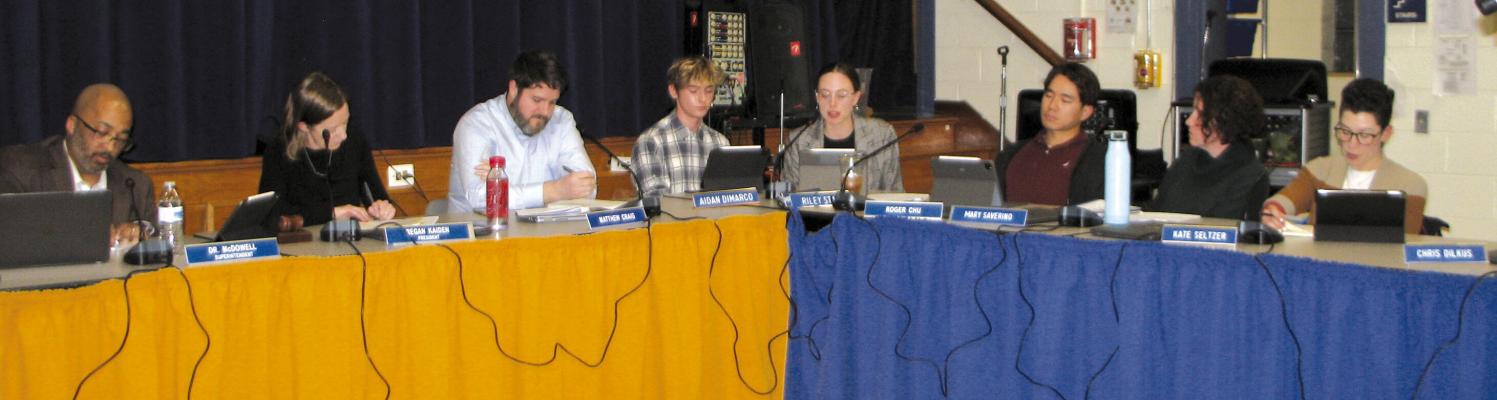 STUDENT REPRESENTATIVES: Collingswood student body representatives Aidan DiMarco and Riley Stacy, center left and right respectively, strongly condemned school superintendent Fredrick McDowell’s leadership of the district.