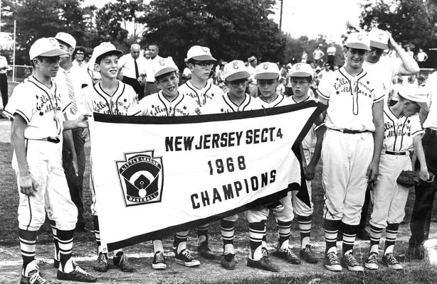 Jon’s team displays their 1968 New Jersey Sect. 4 championship banner